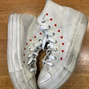 White Converse All Star Platform Hi trainers with red hearts